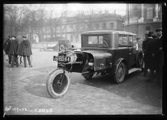 Vintage Peugeot car with a methane gas generator trailer at Place de la Concorde, Paris, 1927