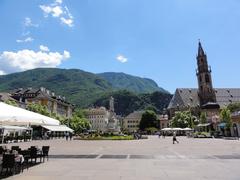 Historical aerial view of the city of Bolzano showcasing traditional European architecture and streets
