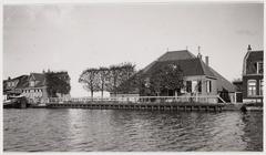 Black and white photo of Buikslotermeerdijk 33-15 viewed northeast in 1922 by Jacobus van Eck