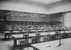 Reading room of Zentralbibliothek Zürich in 1917 with wooden tables and chairs filled with readers