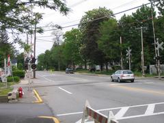Railroad crossing with sidewalk gates in West Acton, Massachusetts