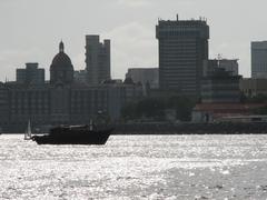 View of the Taj Palace hotel and Gateway of India from a ferry in South Mumbai waterfront