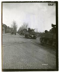 784th Tank Battalion tanks of the 35th Infantry Division advancing from Venlo, Holland towards Germany during WWII