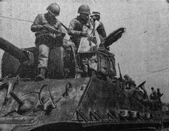 South Korean marine reading a newspaper reporting the May 16, 1961 military coup led by Park Chung-hee in South Korea