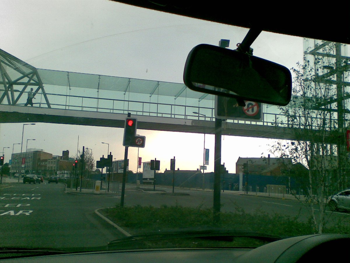 John Lewis Walkway in Highcross shopping center taken from a car on Vaughan Way