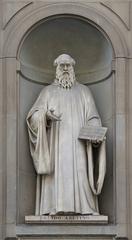 Statue of Guido d'Arezzo at Piazzale degli Uffizi in Florence, Italy