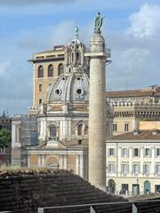 The Trajan's Column from Trajan's Markets in Rome with the Church of Santa Maria di Loreto in the background