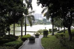 Scenic view of Lake Wenshan at Shenzhen University with clear waters and surrounding greenery under a blue sky