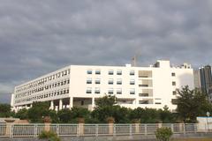Construction of Xili Campus at Shenzhen University, modern architecture with cranes and building materials