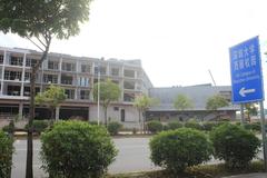 Construction site of Xili Campus of Shenzhen University with cranes and building structures