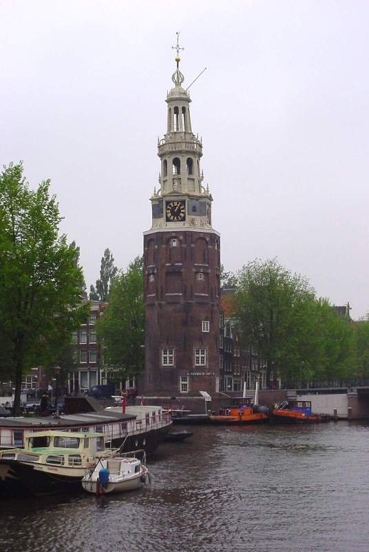 Montelbaan Tower in Amsterdam by the canal