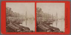 Historic street view of Oudeschans 78-4 in Amsterdam looking north towards Montelbaanstoren tower and Keizersbrug bridge around 1880