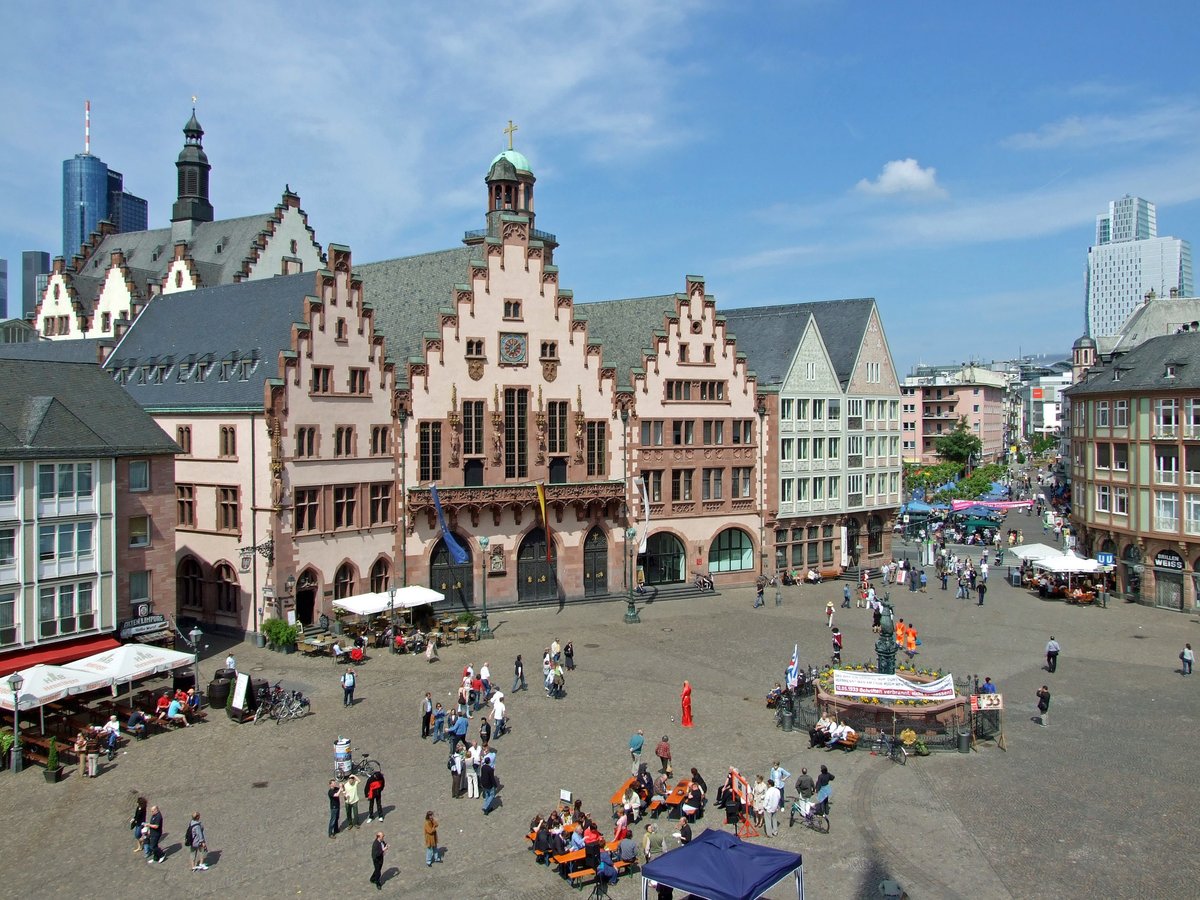Römerberg square in Frankfurt, Germany with historic buildings and blue sky