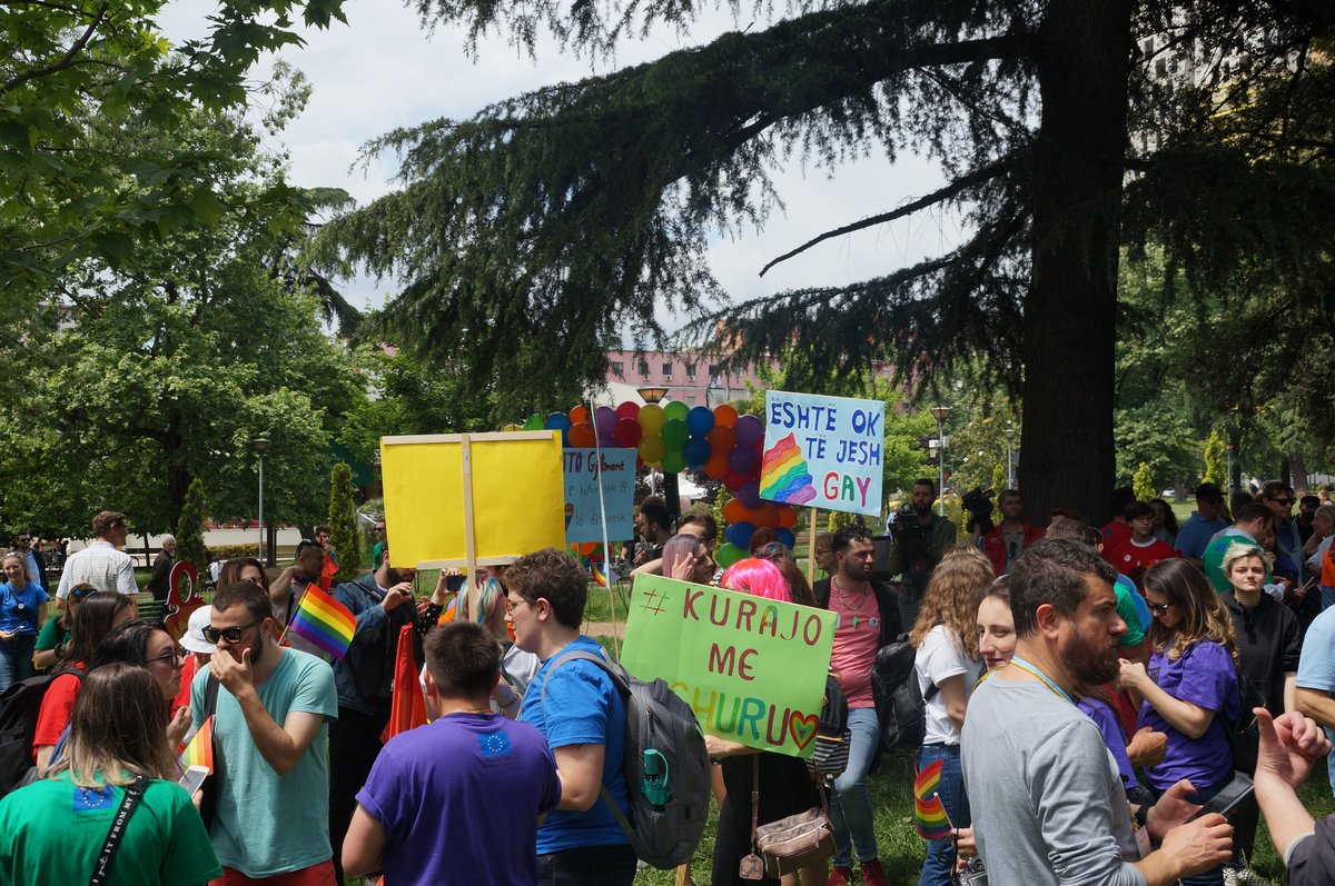 Participants holding a banner reading 'It's ok to be gay' during Tirana Gay Parade 2019