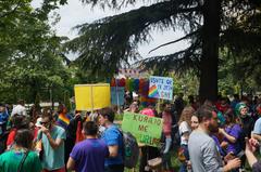 Participants holding a banner reading 'It's ok to be gay' during Tirana Gay Parade 2019