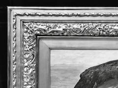 Monochrome close-up detail of a picture frame showing intricate textures