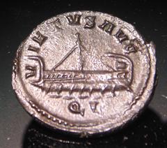 Ancient coin depicting a ship