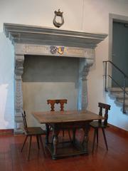 Fireplace with coat of arms relief at Museum zu Allerheiligen in Schaffhausen