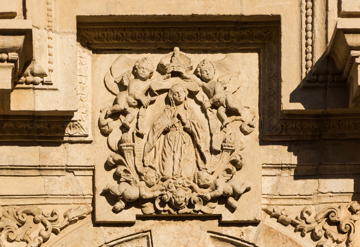 Relief sculpture of the Coronation of the Virgin Mary at San Jeronimo monastery in Granada, Andalusia, Spain