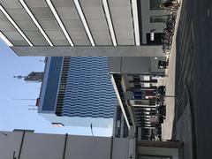 RTS Tower in Geneva cityscape with modern buildings and clear blue sky