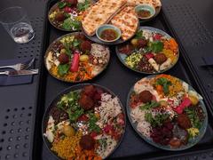 Mezze plates with variety of Mediterranean appetizers served at restaurant Schmock in Münchner Volkstheater