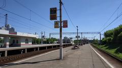 RZD Birulevo-Passazirskaya railway station exterior with trains and platform in 2019
