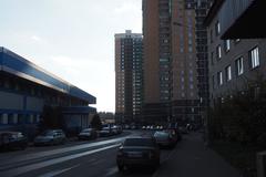 Yagodnaya Street in Biryulyovo Vostochnoye District, Russia with residential buildings and parked vehicles
