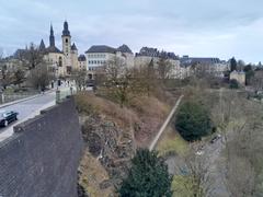 Scenic view of Luxembourg city with historic buildings and greenery