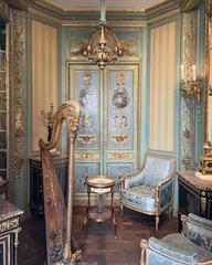 Rococo furniture displayed in the Louvre Museum