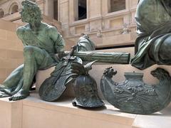 Close-up of sculptures at the Louvre Museum