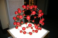 Buckminsterfullerene C60 molecular model made of red beads and silver rods
