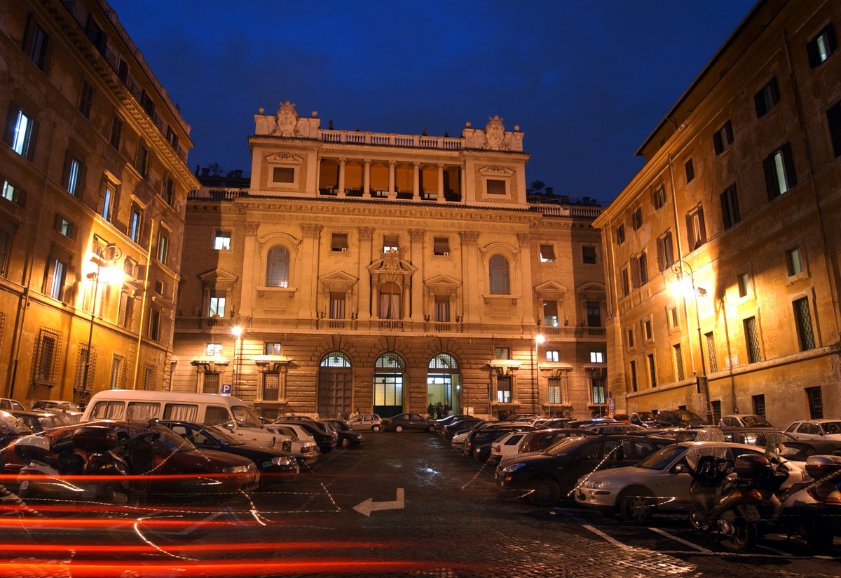 Pontifical Gregorian University building illuminated at night