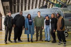 Capt. Carson McKay posing with musical group The War and Treaty at Aviano Air Base