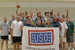 Soldiers at Forward Operating Base Marez in Mosul with university basketball coaches during Operation Hoop Talk