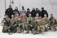 USO Tour 2013 military personnel and performers on stage in Afghanistan