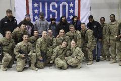 USO Tour 2013 celebrities group photo at Bagram Air Field Holiday Troop Visit