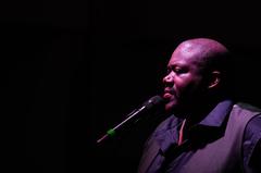 Michael Trotter Jr. singing with The War and Treaty at Aviano Air Base concert
