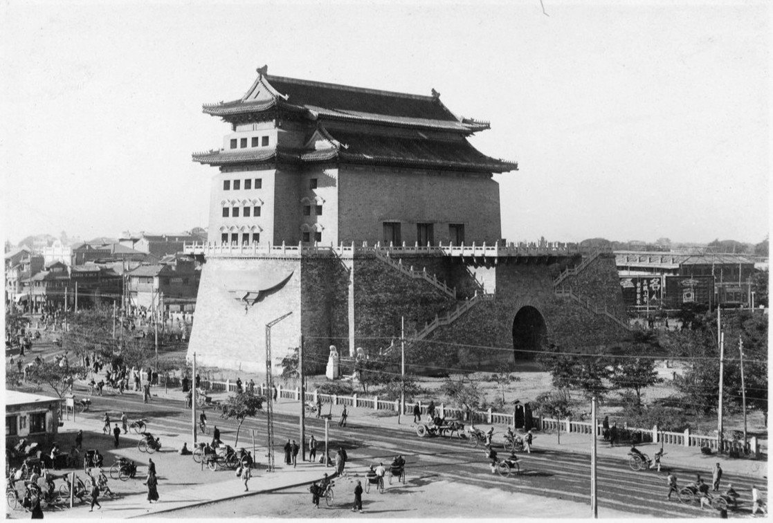 Zhaolou watchtower inside Zhengyang Gate, Beijing with historic city wall in background