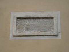 Plaque on the wall of Bonifratri Monastery in Vilnius commemorating church erection by Pawel Olshanski