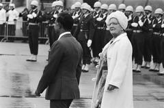 Queen Juliana and Prince Bernhard waving goodbye to Bangladesh President Ziaur Rahman at Schiphol airport in 1979