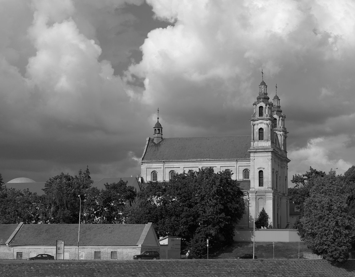 St. Raphael Church in Vilnius with the dome of the Planetarium visible on the left