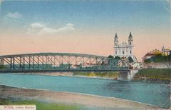 Historical view of Vilnius with the Vialla River, Śnipiški district and Green Bridge in 1917