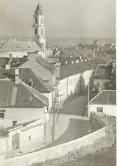 Historic street view in Vilnia, Bakšta street featuring the Church of Our Lady of Consolation and St. Augustine and Augustinian monastery