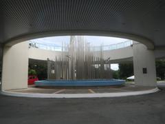 Saint Michael the Archangel Chapel at Fort Bonifacio, Taguig City with Libingan ng Mga Bayani signage and Heroes Memorial Gate in the background