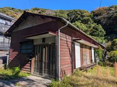 Scenic west side view of Kamakura Japan with mountains and traditional buildings