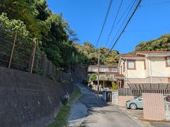 West side of Kamakura scenic view with traditional Japanese houses and lush greenery