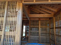 Construction of a traditional house with bamboo walls in Kamakura