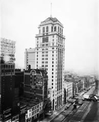 Facade of the Candler Building at 224 West 42nd Street, New York City, with the New Amsterdam Theatre showing signage for the 1913 production Oh! Oh! Delphine