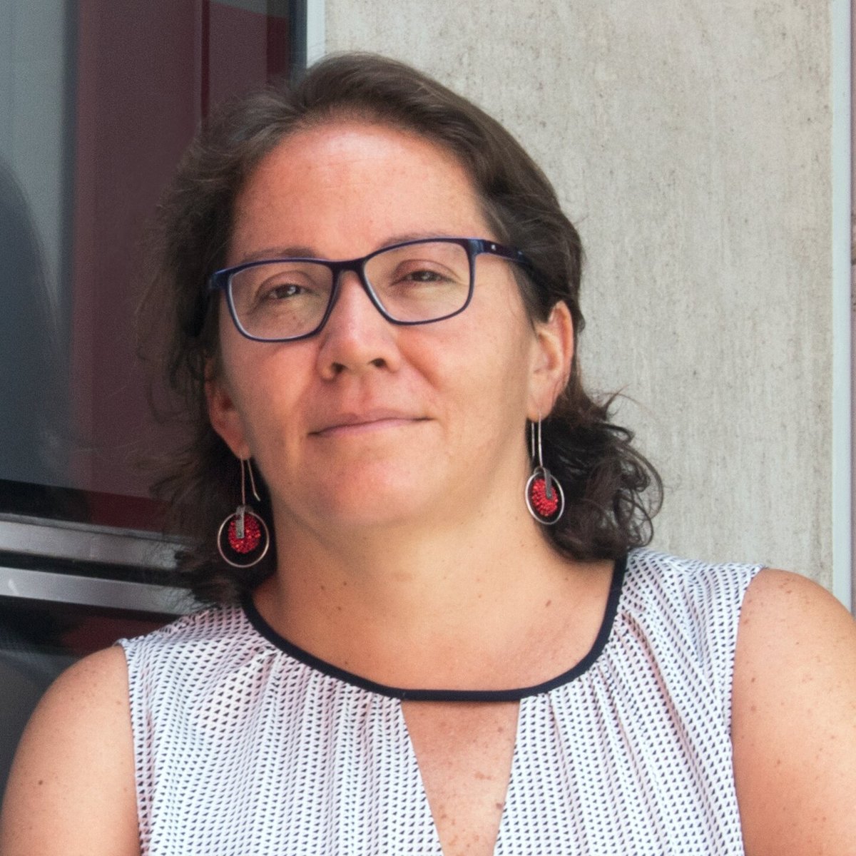 Portrait of researcher and professor Camila Gianella
