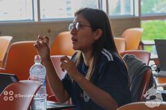 Student sharing opinion during an editathon session